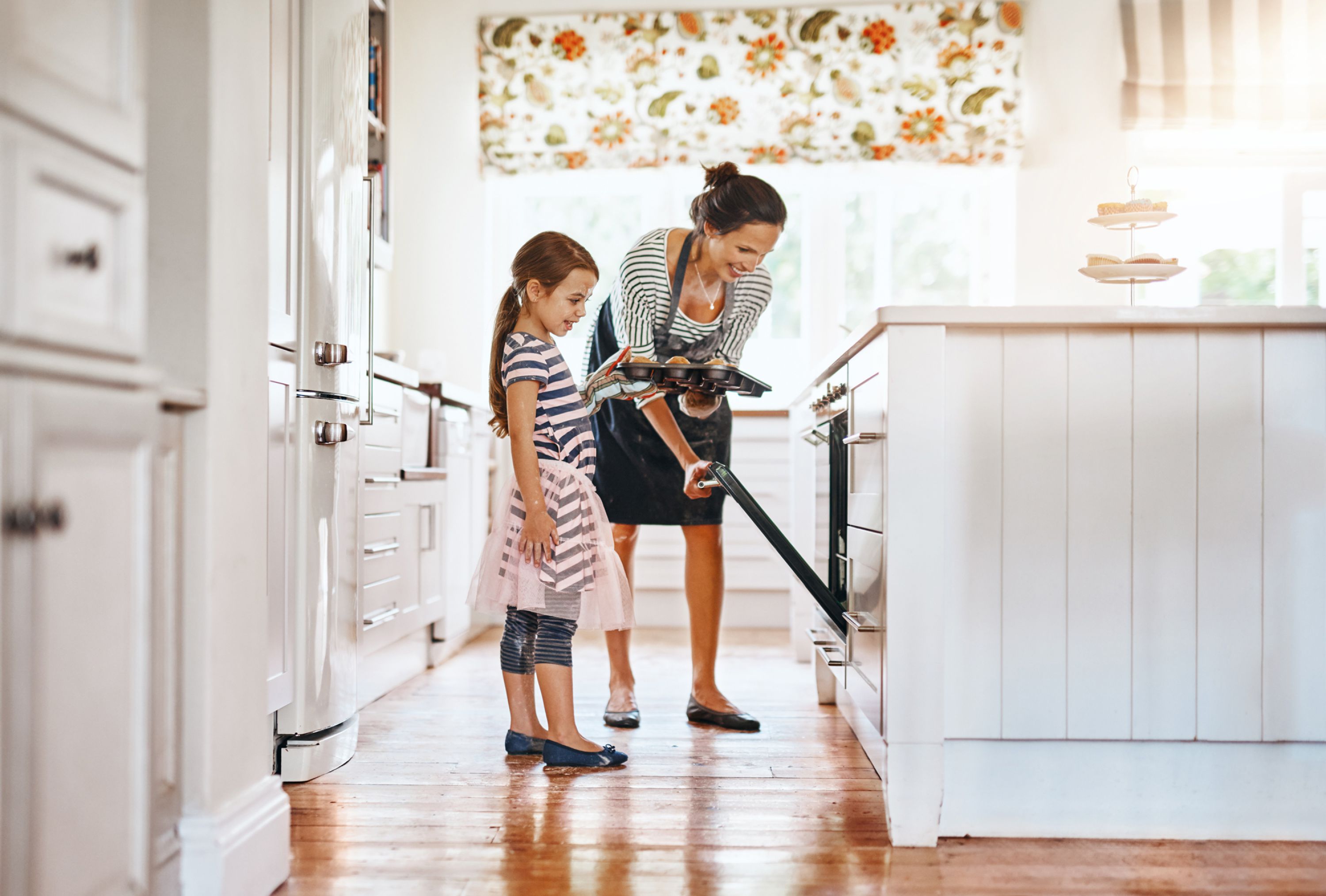 Mother and daughter cooking